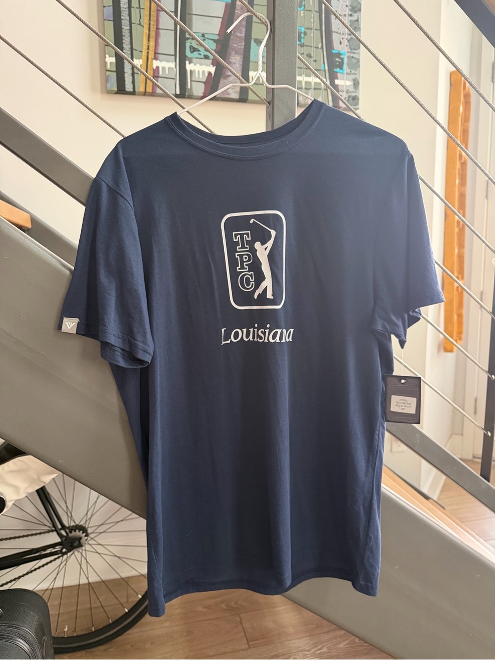 Navy blue TPC Louisiana golf tee shirt